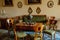 Krasny Dvur Chateau, North Bohemia, Czech Republic, 19 June 2021: Castle interior, Biedermeier furniture in living room table with