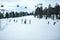 KREISCHBERG, MURAU, AUSTRIA - MARCH 15, 2017: Many skiers ride in Alps at sunny winter day. Cable car in mountains