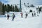 KREISCHBERG, MURAU, AUSTRIA - MARCH 15, 2017: Many skiers ride in Alps at sunny winter day. Cable car in mountains