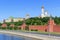 Kremlevskaya embankment on a Moscow Kremlin towers background in sunny summer morning