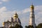 Kremlin architectural ensemble at sunny day. Golden domes of churches sparkle in the sun.