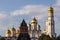 Kremlin architectural ensemble at sunny day. Golden domes of churches sparkle in the sun.