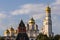 Kremlin architectural ensemble at sunny day. Golden domes of churches sparkle in the sun.