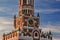 Kremlin clock tower in the rays of the setting sun