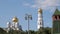 Kremlin tower and white cathedrals with golden domes