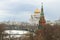 Kremlin towers against the background of the Cathedral of Christ the Savior on a cloudy April day. Moscow