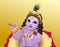 Krishna Janmashtami indian religious holiday God birthday. Blue boy playing flute