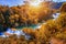 Krka national park with autumn colors of trees, famous travel destination in Dalmatia of Croatia. Krka waterfalls in the Krka