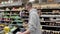 Kroger interior supply chain staffing pan of coffee and man wearing face mask walking by