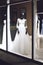 KROPIVNITSKIY; UKRAINE â€“ 22 September; 2018: Black female mannequin in wedding dress in showcase. Bridal dresses Salon