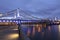 Krymsky Bridge or Crimean Bridge at night is a steel suspension bridge in Moscow