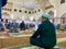 Kuala Lumpur, Malaysia - April 12th, 2021 : Muslim clerics practice social distancing while reciting tarawih evening