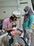 KUALA LUMPUR , MALAYSIA - JUL 7, 2020: Dentist checking 8 years old little girl teeth during Covid 19 pandemic