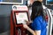 KUALA LUMPUR, MALAYSIA, JUNE 18, 2018: Passenger using convenient self check-in kiosk machine at KL International Airport