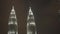 KUALA LUMPUR, MALAYSIA - JUNE 29, 2017: night time close zoom in shot of petronas twin towers in kuala lumpur