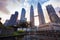 Kuala Lumpur, Malaysia - March 20, 2019: Wide angle sunset shoot of legendary Petronas Twin Towers or Menara Berkembar Petronas in