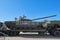 KUBINKA, RUSSIA, AUG.24, 2018: Russian tank T-72 on military truck trailer in transportation mode. Military engineering transport