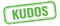 KUDOS text on green grungy vintage stamp