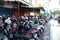 Kudus, December 2022. Photo of a crowded motorbike parking lot in the Kudus city square. Crowded visitors come to the Kudus