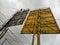 Kudus, Indonesia - February 27 2022: back of a metal billboard with a lot of electrical cables