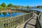 Kuirau Park, Rotorua, New Zealand. Walkway across steaming geothermal lake