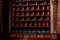 Kuks, Czech Republic, 8 October 2022: interior of historic pomegranate apple pharmacy, vintage glass bottles on wooden table,