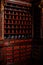 Kuks, Czech Republic, 8 October 2022: interior of historic pomegranate apple pharmacy, vintage glass bottles on wooden table,