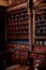 Kuks, Czech Republic, 8 October 2022: interior of historic pomegranate apple pharmacy, vintage glass bottles on wooden table,