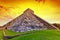 Kukulkan pyramid in Chichen Itza at sunset