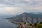 Kula - Scenic aerial view of coastal town Omis surrounded by Dinara mountains in Split-Dalmatia, South Croatia. Hiking trail