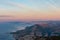 Kula - Scenic aerial view of coastal town Omis surrounded by Dinara mountains in Split-Dalmatia, South Croatia. Hiking trail