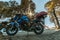 Kullu, Himachal Pradesh, India - November 24, 2019 : Motorcycle ride on winter slippery road in himalayas