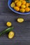 Kumquat fruit in a blue bowl