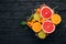 Kumquat, orange and grapefruit. Fresh Tropical Fruits.
