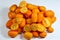 Kumquats, cumquats, a group of small, angiosperm, fruit-bearing trees in the family Rutaceae, golden orange, an edible fruit