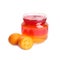Kumquats and tasty layered jelly dessert in glass jar on white