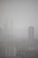 Kunming, China- June 2021: Depressing Chinese city in a fog and smog like a ghost town.