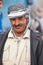 Kurdish man with traditional clothes smiling to the camera