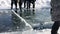 Kurgan , RUSSIA - February 14, 2016 : Adult men use special saws for cutting ice on the extreme sailing on the frozen