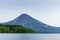 Kurile lake. Kamchatka. Russia. Green fields and volcanoes. Wild nature