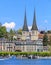 Kurplatz square and towers of the Church of St. Leodegar in Luce