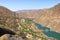 Kurpsai Hydro station. Lower Naryn River Canyon near Toktogul in Kyrgyzstan. Hydroelectric dam in central asia