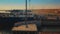 KURYK, KAZAKHSTAN - OCTOBER 16, 2018: Cargo ferry sea on blue background. Transportation industry. Sunset view. Drone
