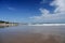 Kuta beach bali wet sand reflecting sky