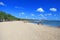 Kuta Beach with blue sky in Kuta, Bali, Indonesia.