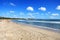 Kuta Beach with blue sky in Kuta, Bali, Indonesia.