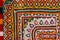 Kutch art work,Kutchhi handicrafts embroidery,Gujarat mirror work close up view,Made of needle cord,Detail patchwork carpet.close