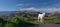 Kuvasz Dog with beautiful scenic landscape in the background