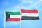 Kuwait and Yemen two flags on flagpoles and blue sky