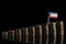 Kuwaiti flag with lot of coins on black